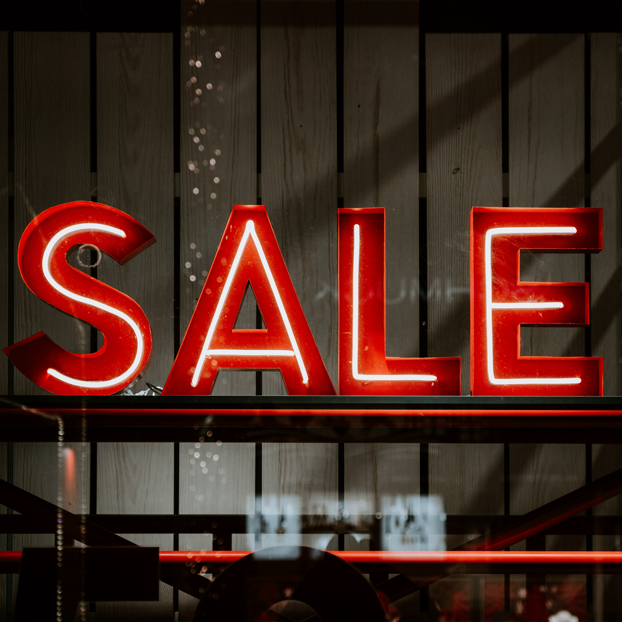 Red sale sign in window